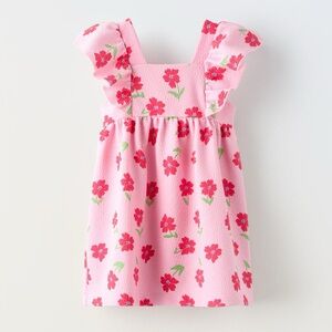 Pink floral pinafore dress